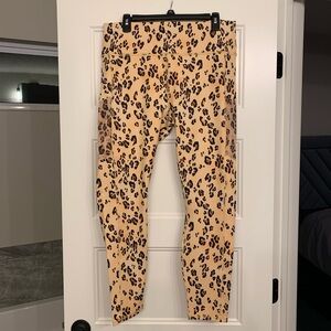 Mila High Waisted Pocket Legging. Peachy Orangey Leopard/Animal Print Fabletics